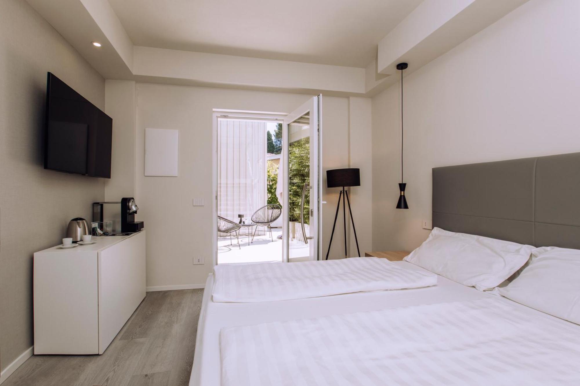 Ah Porticcioli Boutique Apartments San Felice del Benaco Bagian luar foto